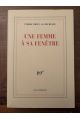 Une femme à sa fenêtre