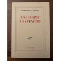 Une femme à sa fenêtre